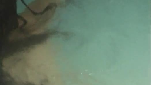 Orgasm in a swimming pool