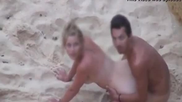 Young couple gets caught fucking doggystyle on the beach