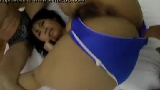 Girl in blue dress getting her pussy fingered while sucking other guys cock on the bed